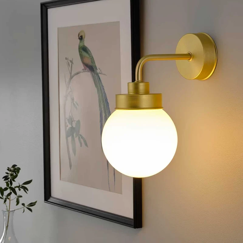 Frihult wall lamp brass