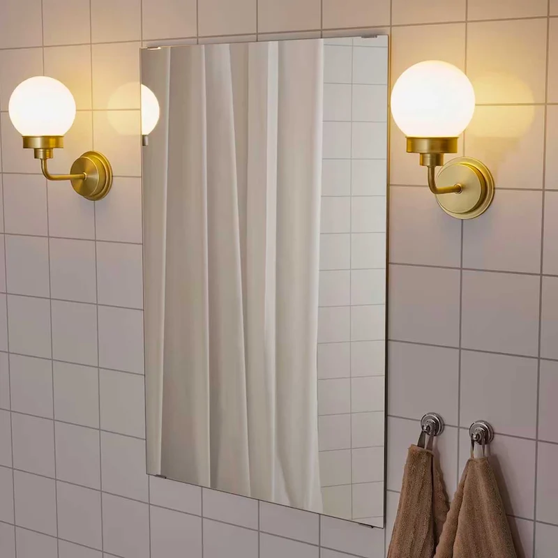 Frihult wall lamp brass