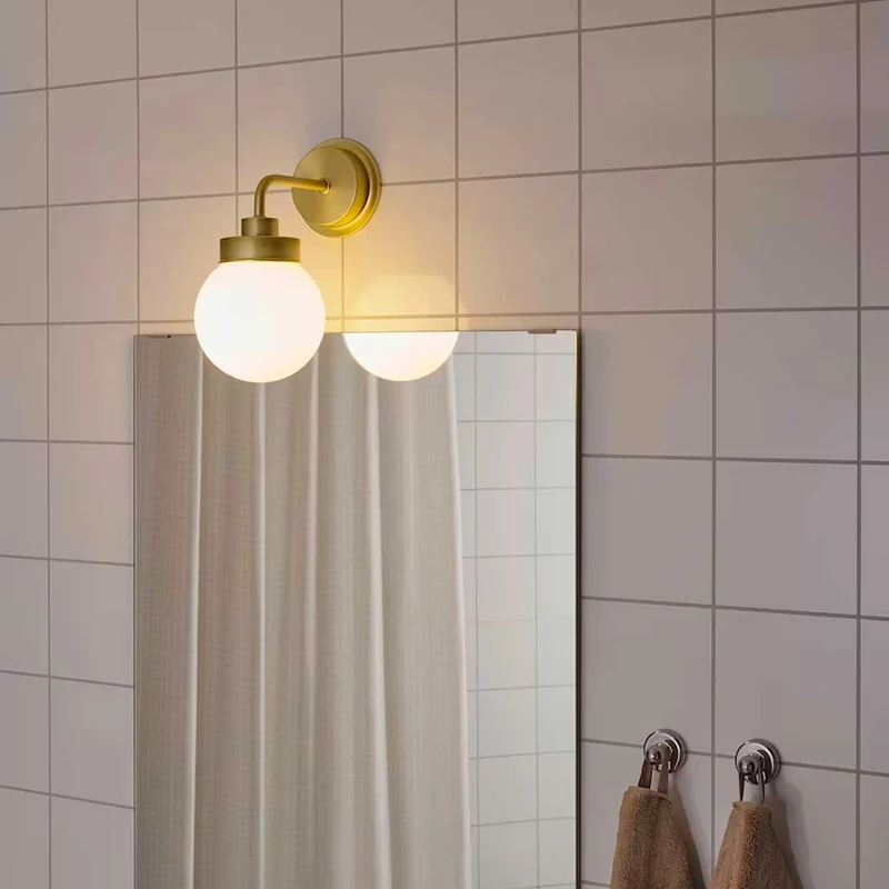 Frihult wall lamp brass