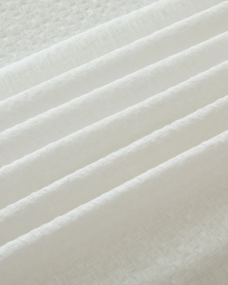 Unwind 52 x 95 Inch Triple French Pinch Pleat White Linen Grid Woven Sheer Curtain