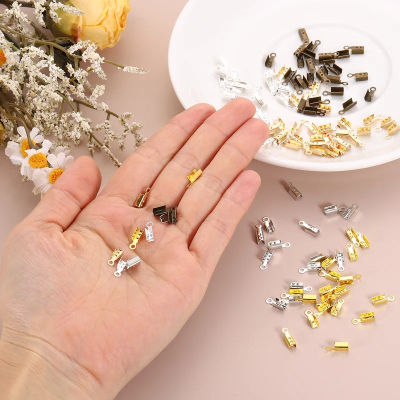 600 Pcs Fold Over Cord Ends, 10.2x2.5mm Ribbon Crimp Ends Cap (5 Colors)